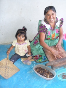 Sofía making chocolate with granddaughter Elena in San Miguel del Valle