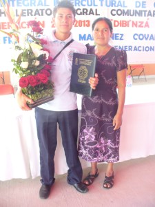 Hugo with mom Lupita at his high school graduation in 2013. I was his "sponsor," which meant I provided flowers and walked across the stage with him.